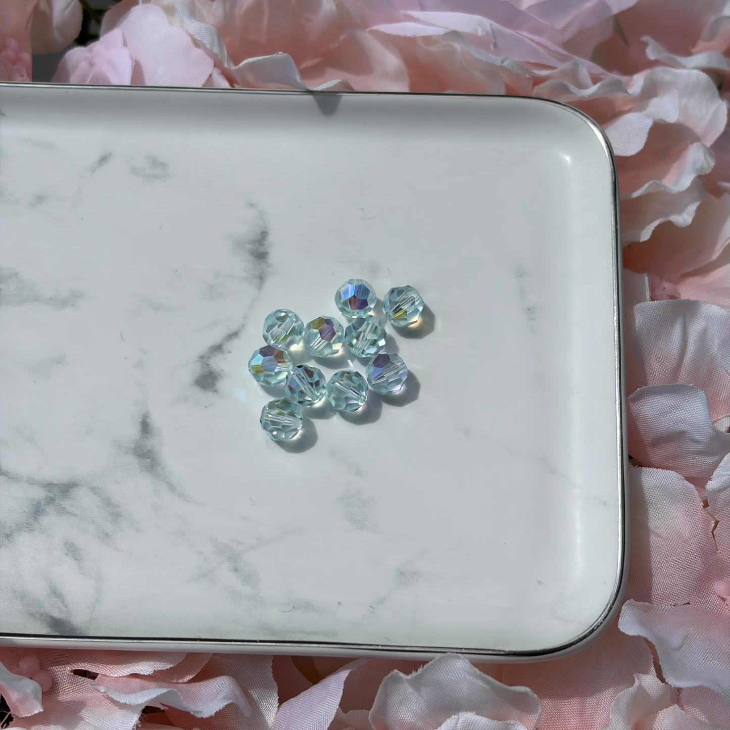 8MM - SWAROVSKI FACETED ROUND - LIGHT AZORE AB