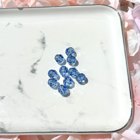 8MM - SWAROVSKI FACETED ROUND - LIGHT SAPPHIRE